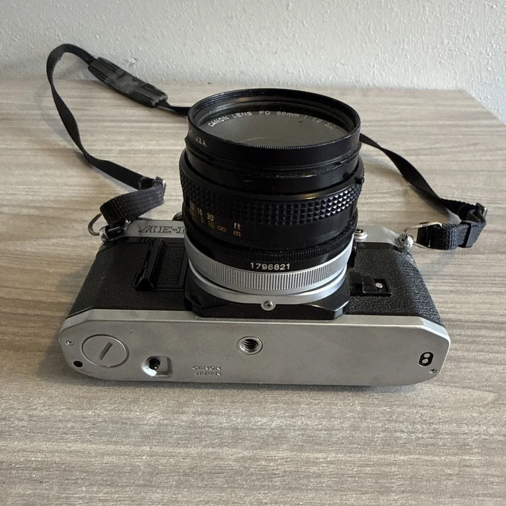 Canon AE-1 SLR 35mm Film Camera w/ Canon Lens FD 50mm F1.8!l Tested Works